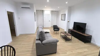 Una televisión o centro de entretenimiento en Apartamento Santísima Trinidad