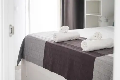 Cama o camas de una habitación en Alohamundi San Basilio II
