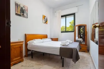 Cama o camas de una habitación en Palacio de Congresos piscina y parking