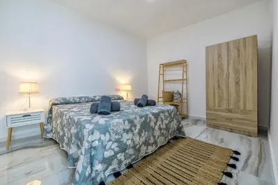 Cama o camas de una habitación en El Patio del Agua - Luxury Center Apartment