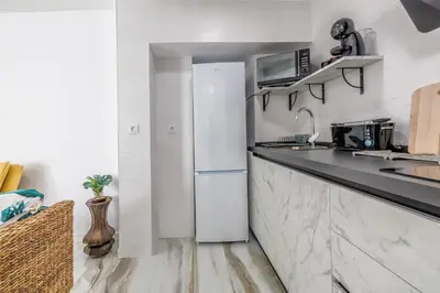 Una cocina o zona de cocina en El Patio del Agua - Luxury Center Apartment