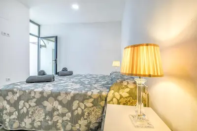 Cama o camas de una habitación en El Patio del Agua - Luxury Center Apartment