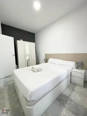 Cama o camas de una habitación en Macarena Apartment