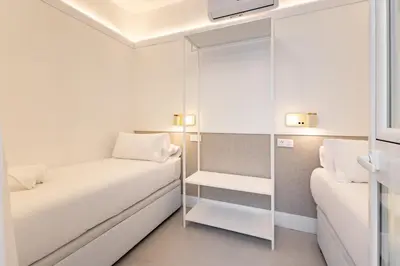 Cama o camas de una habitación en ISG Apartments Family Stay San Marcos