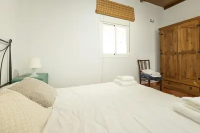 Cama o camas de una habitación en Cortijo Sierra del Agua