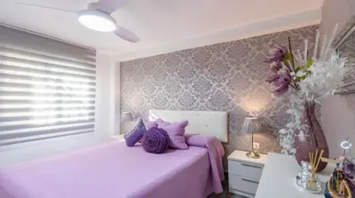 Cama o camas de una habitación en La Magia del Rosa