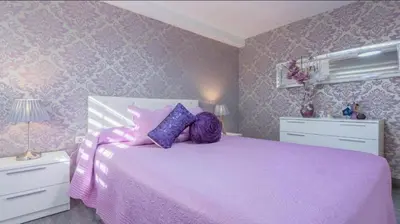 Cama o camas de una habitación en La Magia del Rosa