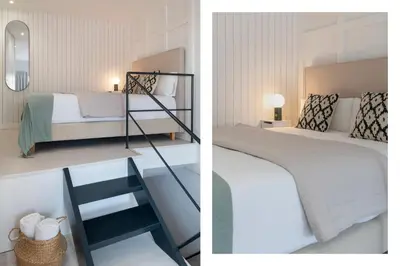 Cama o camas de una habitación en Magno Apartments Plaza San Gil