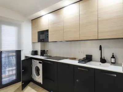 Una cocina o zona de cocina en Apartamentos Casa Miguel