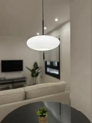 Una televisión o centro de entretenimiento en Apartamentos Casa Miguel