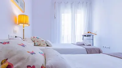 Cama o camas de una habitación en Vive Córdoba Apartamento junto a Estación y Centro