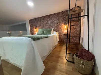 Cama o camas de una habitación en Jaén Interior LOFT