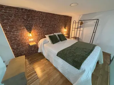 Cama o camas de una habitación en Jaén Interior LOFT