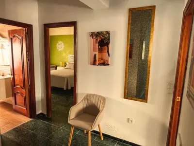 Cama o camas de una habitación en Ronda Suite, Parking gratuito cercano