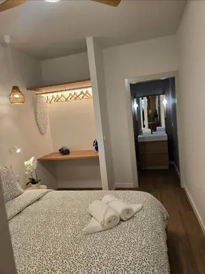 Cama o camas de una habitación en LHOME Puerta Osario Centro