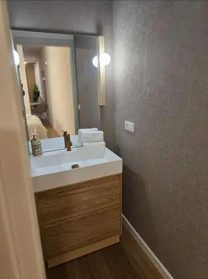 Un baño de LHOME Puerta Osario Centro