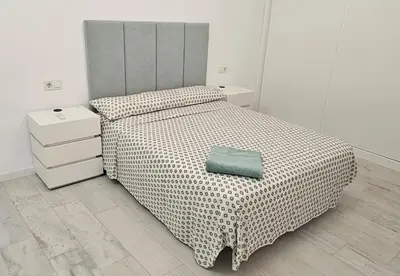 Cama o camas de una habitación en Apartamento Deluxe con Suite principal- a 5 min del centro histórico