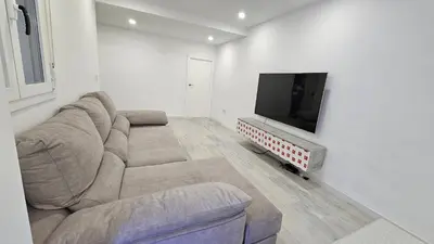 Una televisión o centro de entretenimiento en Apartamento Deluxe con Suite principal- a 5 min del centro histórico