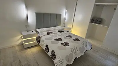 Cama o camas de una habitación en Apartamento Deluxe con Suite principal- a 5 min del centro histórico