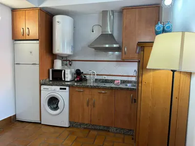 Una cocina o zona de cocina en Apartamento Plaza De La Corredera
