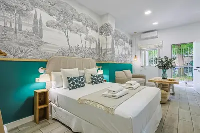 Cama o camas de una habitación en Sevilla Legacy Santa Justa
