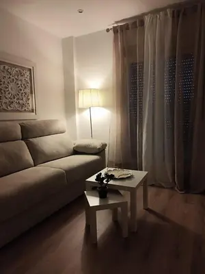 Zona de estar de Osario Suite