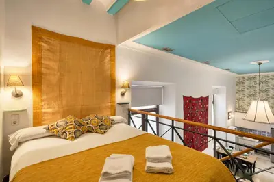 Cama o camas de una habitación en Santiago 39, by Homing U
