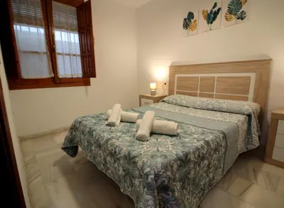 Cama o camas de una habitación en El Refugio de la Judería