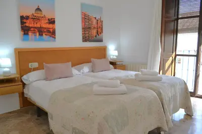 Cama o camas de una habitación en Sunshine Patio de Fernando Colon