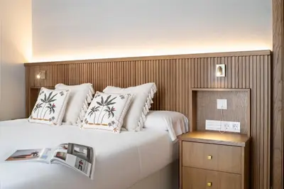 Cama o camas de una habitación en MonKeys Apartments Calatrava Deluxe
