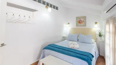 Cama o camas de una habitación en Bajo la Roca Setenil de las Bodegas by Ruralidays
