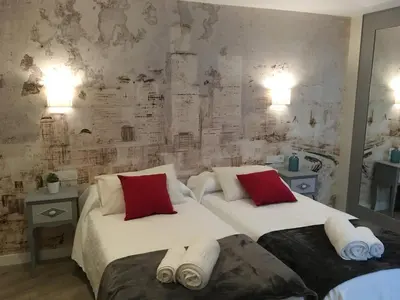 Cama o camas de una habitación en Loft CELINDA y Loft FRESIA