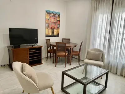 Una televisión o centro de entretenimiento en Geysotur Alcántara
