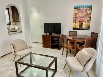 Una televisión o centro de entretenimiento en Geysotur Alcántara