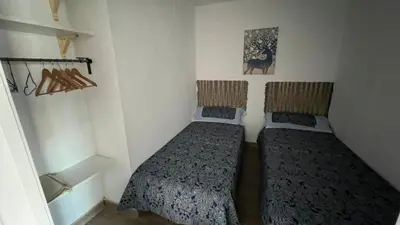 Cama o camas de una habitación en Apartamento Sevilla capital