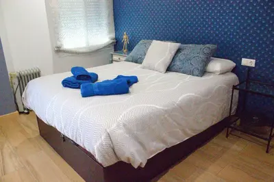 Cama o camas de una habitación en Bonito piso en el centro de Cordoba by beBalmy