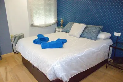 Cama o camas de una habitación en Bonito piso en el centro de Cordoba by beBalmy