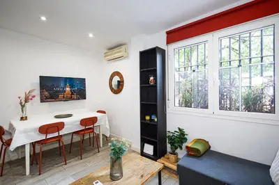 Zona de estar de Acogedor Piso de 2 Dormitorios en Sevilla