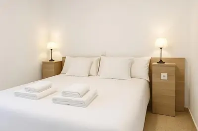 Cama o camas de una habitación en RentalSevilla Hiniesta