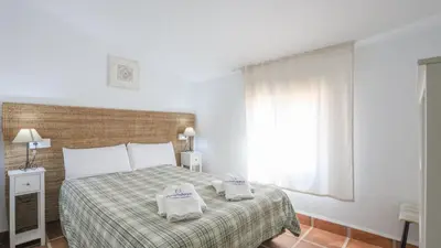 Cama o camas de una habitación en La Era del Bonete Constantina by Ruralidays