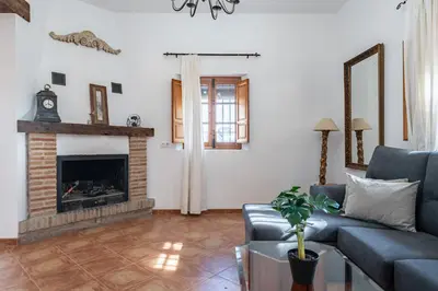 Zona de estar de MalagaSuite Cortijo Segura