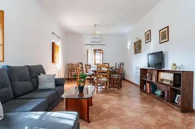 Zona de estar de MalagaSuite Cortijo Segura