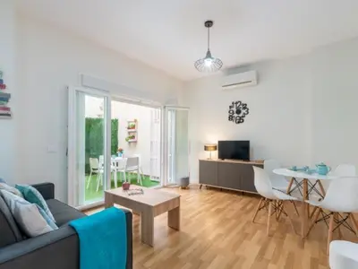 Zona de estar de 1 Dorm Elegante en la Sevilla más autentica