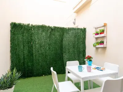 Jardín al aire libre en 1 Dorm Elegante en la Sevilla más autentica