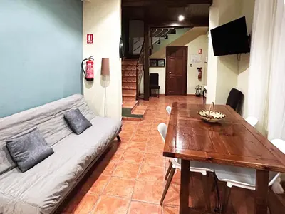 Una televisión o centro de entretenimiento en Casa del Mirador