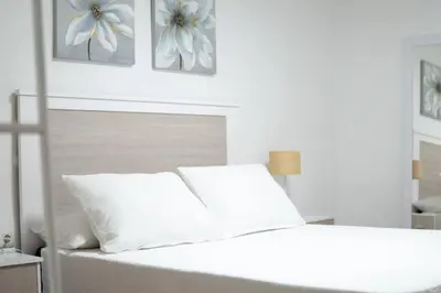 Cama o camas de una habitación en Alojamiento Suite Azahar V & J