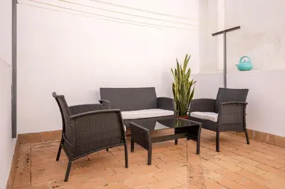 Zona de estar de San Luis Duplex Center by Valcambre