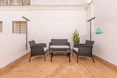 Zona de estar de San Luis Duplex Center by Valcambre