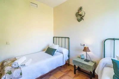 Cama o camas de una habitación en Cubo's Casa Rural Cortijo El Puntal