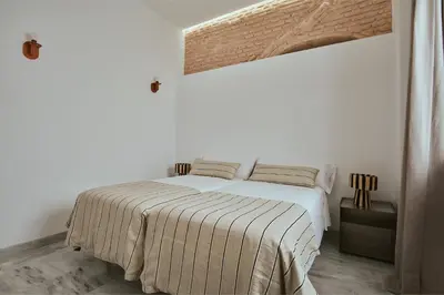 Cama o camas de una habitación en Alameda. Jesus del Gran Poder